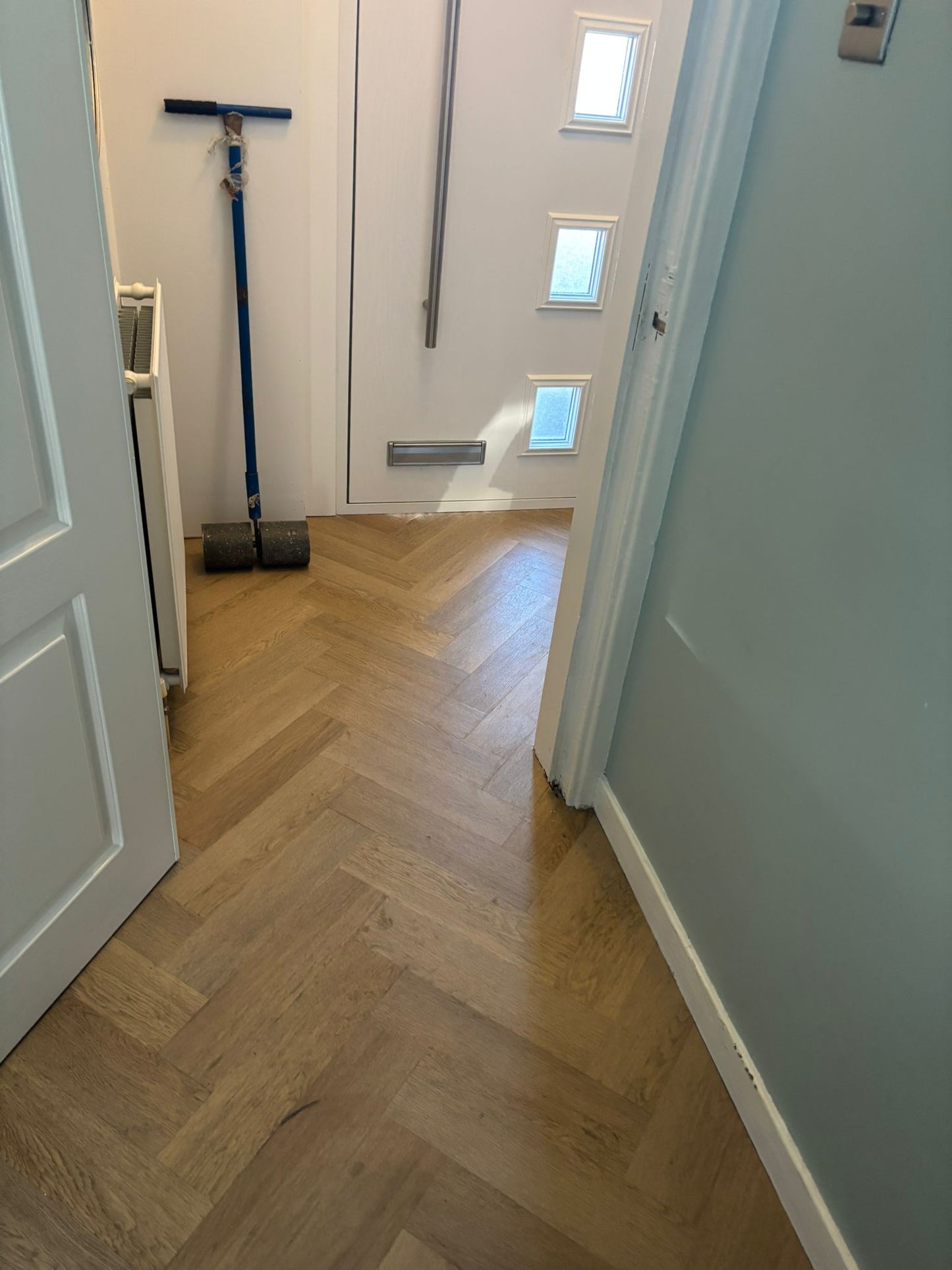 Invictus Brushed Oak Herringbone Glue Down Waterproof Flooring