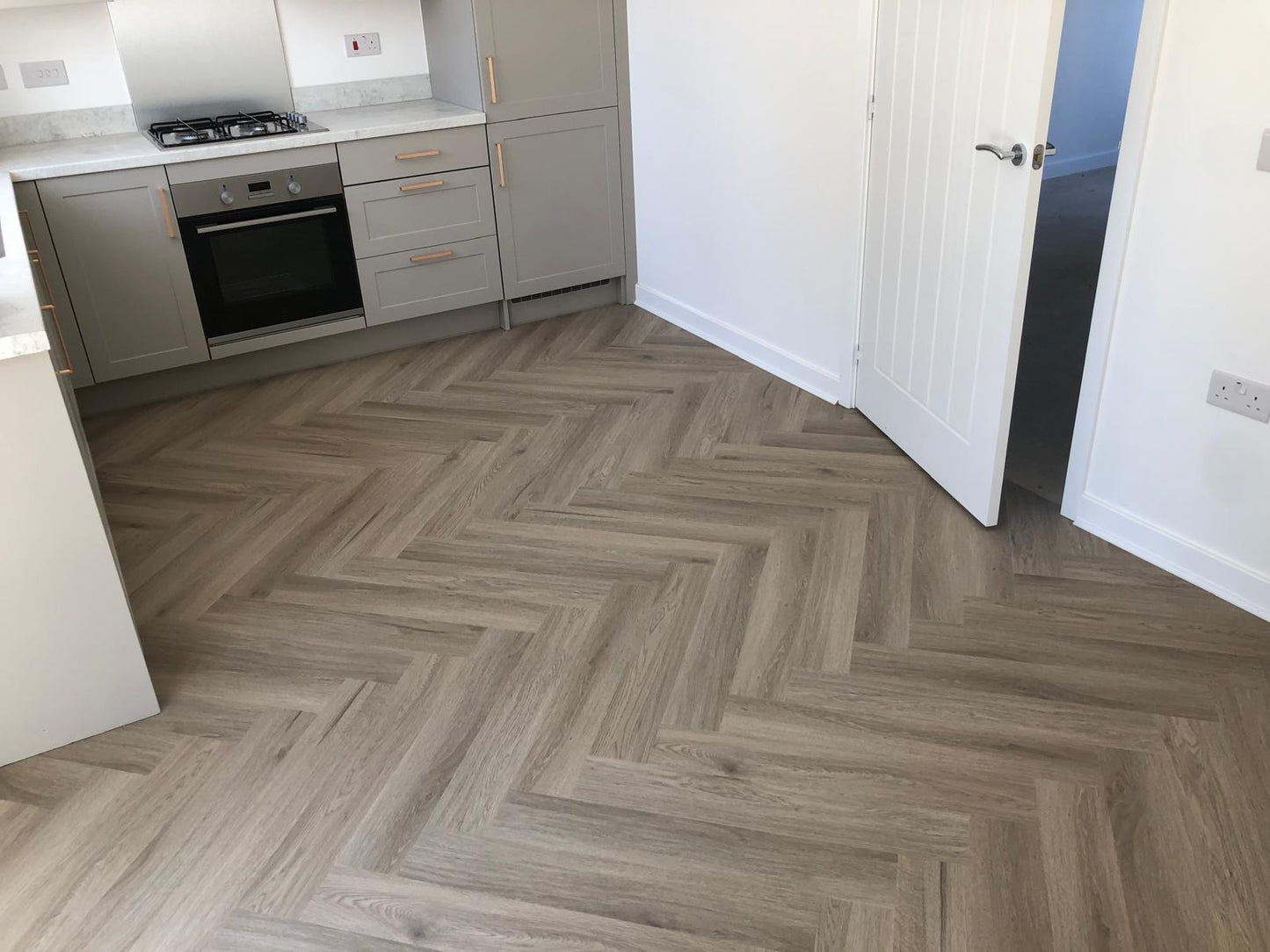 Smoked Oak 5.5mm Herringbone Waterproof Click Vinyl