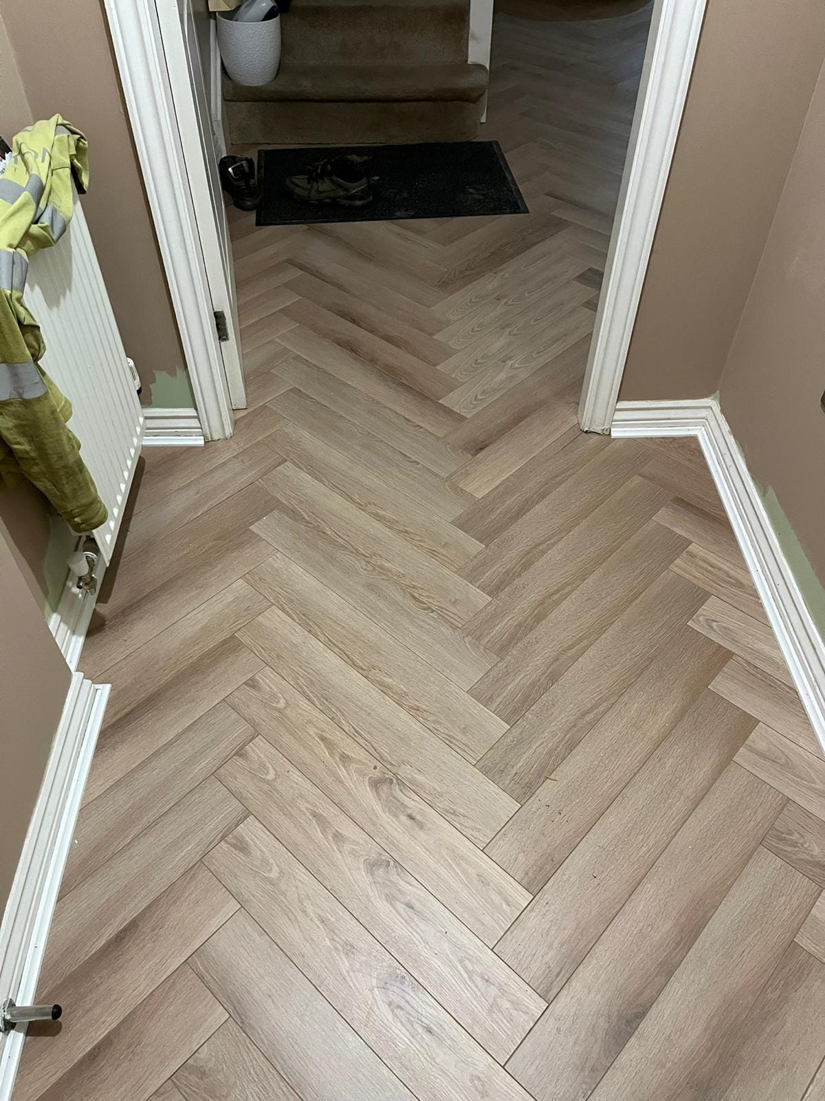 Ambassador Oak 12mm Herringbone Laminate