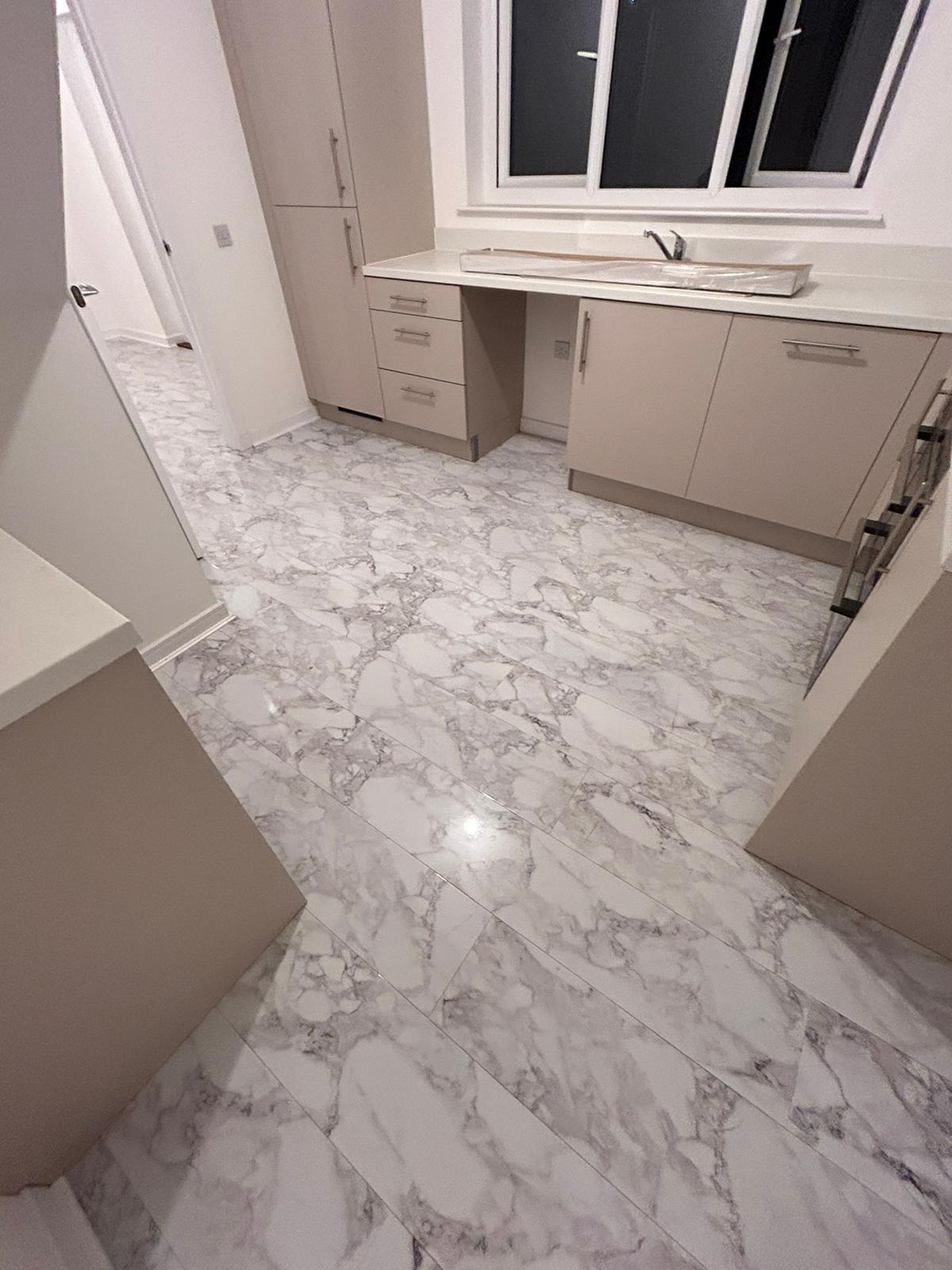 Evolve Marble Ultra Gloss 8mm Waterproof Straight Laminate