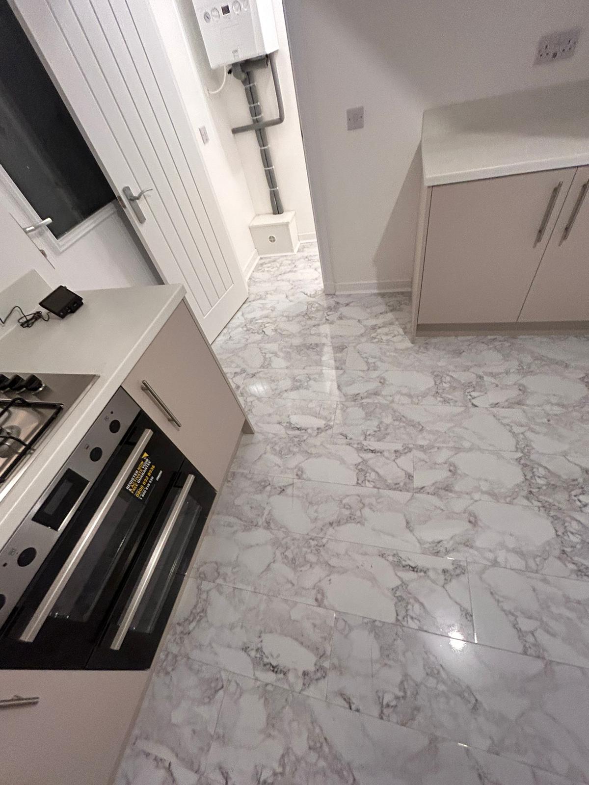 Evolve Marble Ultra Gloss 8mm Waterproof Straight Laminate