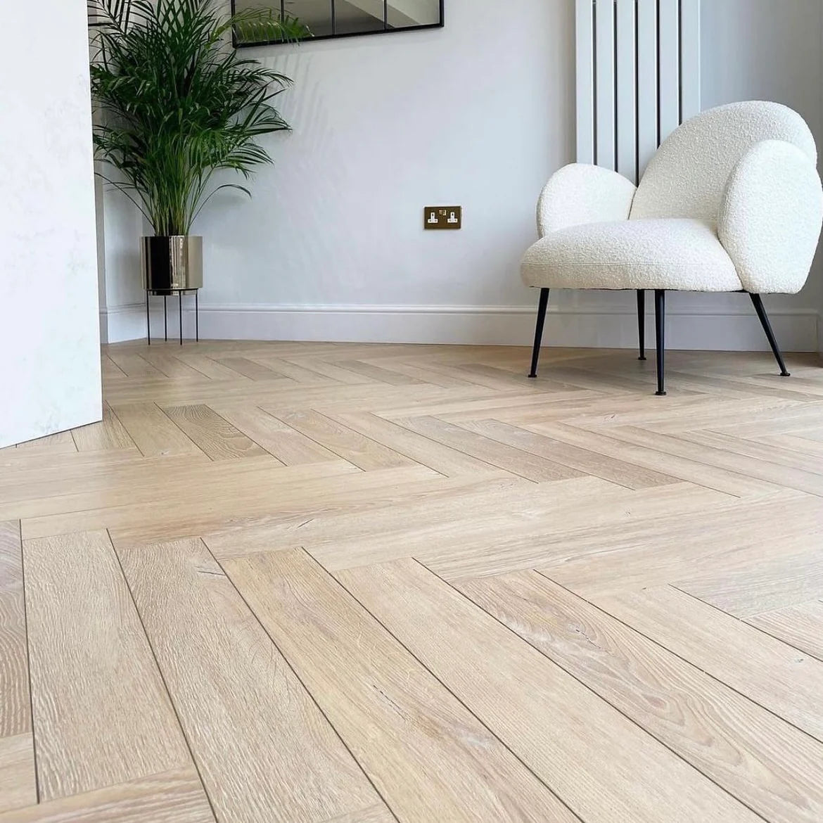 Belgravia Oak 12mm Herringbone Laminate