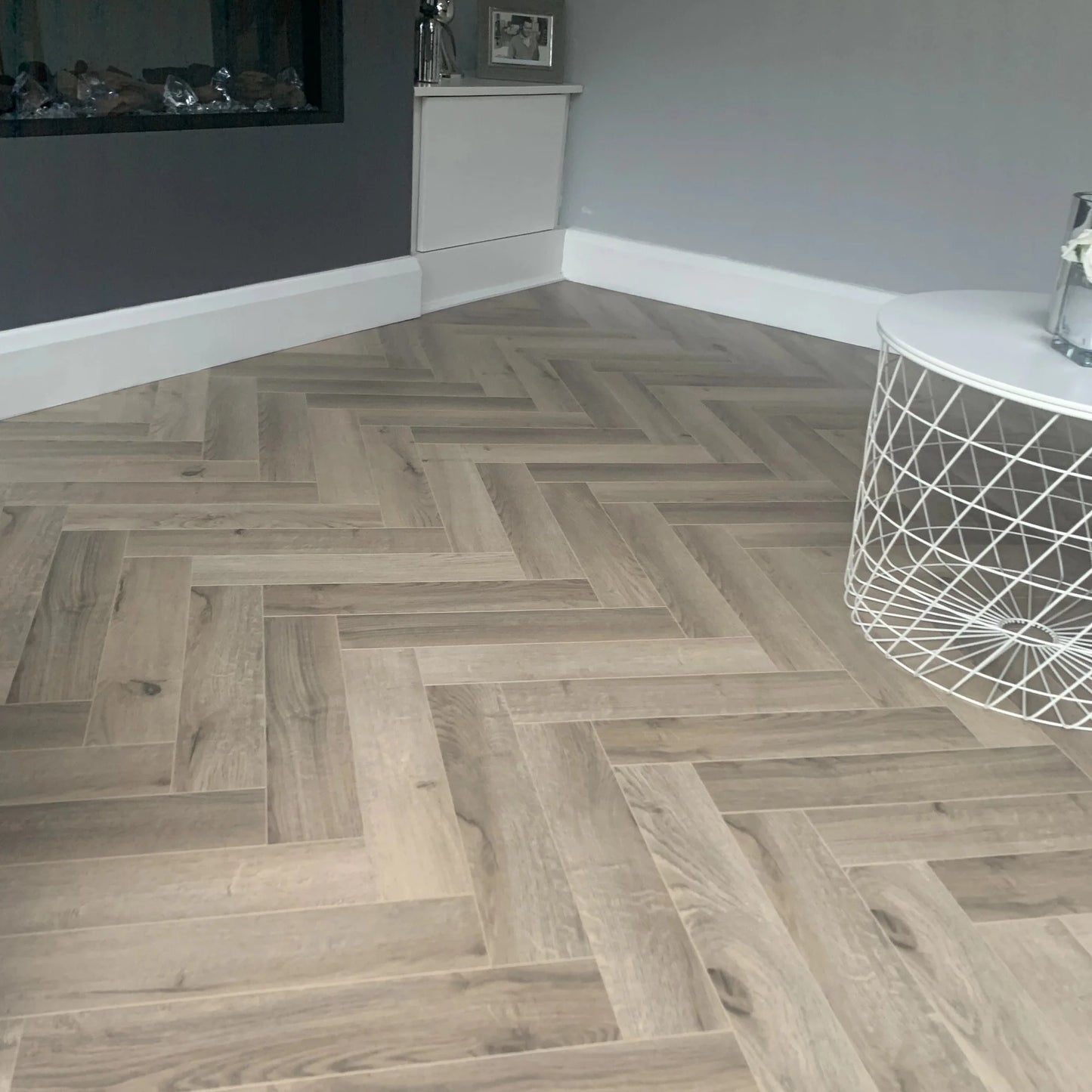 Clarendon Mist 12mm Herringbone Laminate