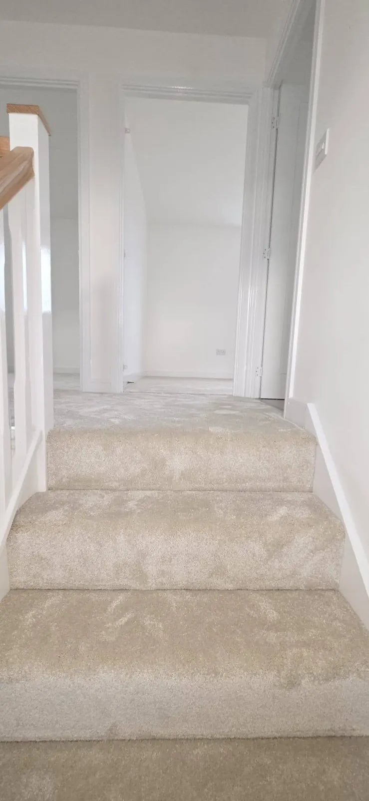 Carpet fitted on a staircase and landing